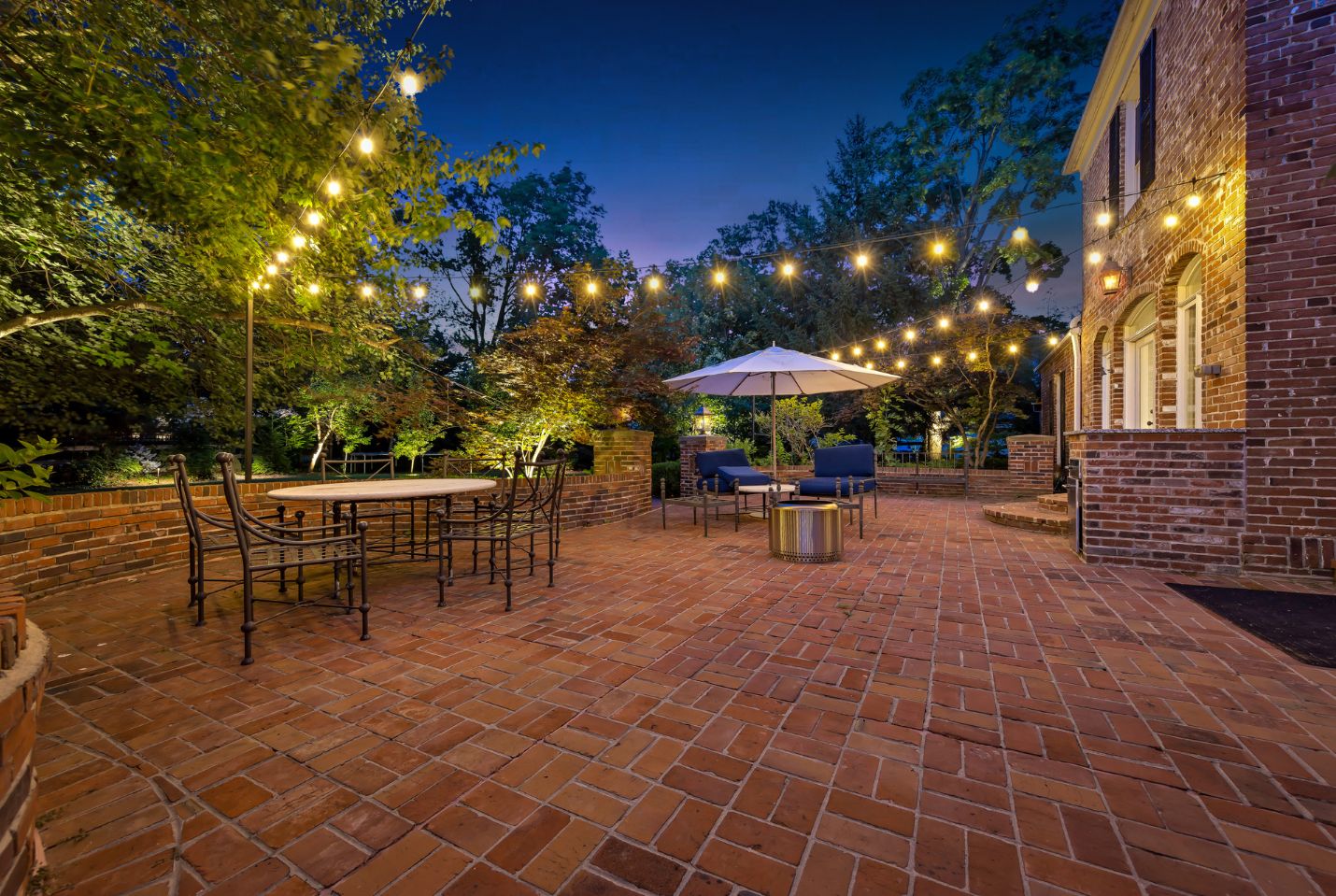 Charlotte summer string lighting over a patio
